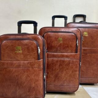 Brown leather textured trolley suitcase set with wheels and retractable handles – 3 piece luggage set for travel.