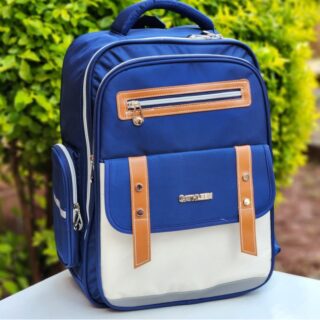 Classic blue school backpack with leather trim and multiple compartments