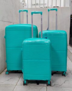 3-piece turquoise hard-shell trolley suitcase set with spinner wheels and telescopic handles – cabin, medium, and large travel luggage