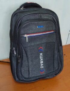 A modern black backpack with a clean, textured design