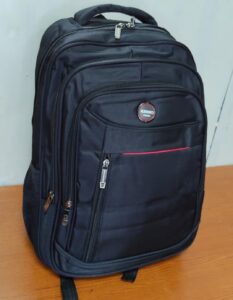 Black multi-compartment backpack with zippers, side pockets, and padded straps – perfect for school, laptop, work, and travel use