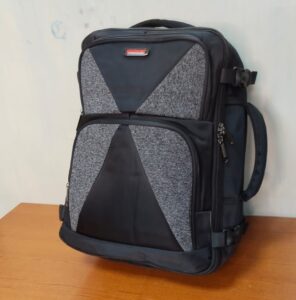 A structured black and gray backpack with a travel-ready design