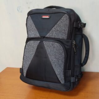 A structured black and gray backpack with a travel-ready design