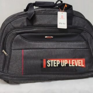 Black duffel travel bag with “STEP UP LEVEL” design in red and white print
