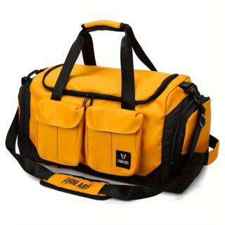 Yellow and black duffel bag with multiple front pockets, top handles, and adjustable shoulder strap – ideal for gym, travel, or sports use