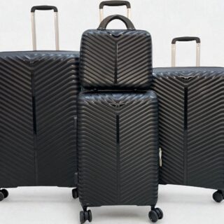 4-piece black hard shell luggage set with chevron pattern, includes large suitcases, carry-on, and travel bag
