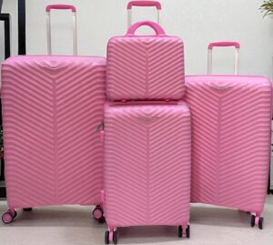 A set of 4 Bubblegum Pink hard-shell rolling suitcases