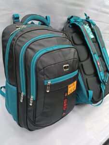 Black and teal backpacks with multiple zippered compartments and padded backs