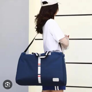 Navy blue duffel bag with striped design, shoulder strap