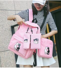Pink backpack set with cute black and white cat couple design — includes school bag, lunch bag, and pencil pouch.